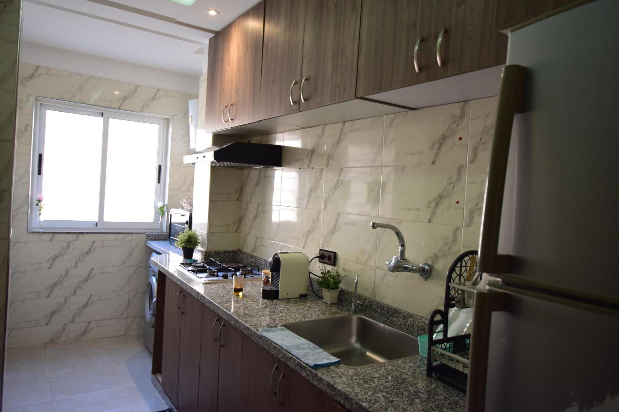 Appartement Familial Proche Aeroport Et Oasiria マラケシュ エクステリア 写真