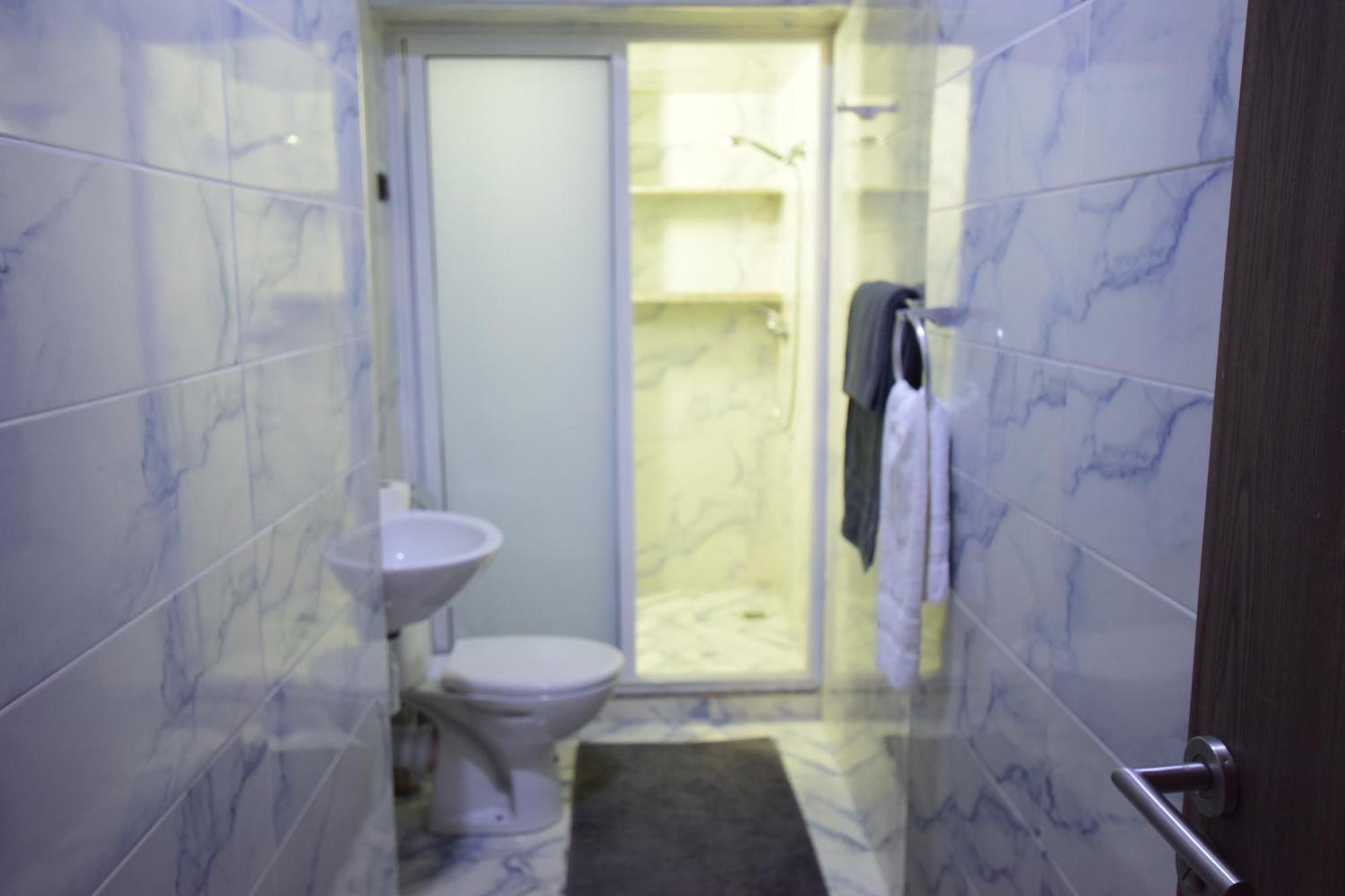 Appartement Familial Proche Aeroport Et Oasiria マラケシュ エクステリア 写真